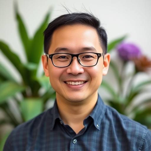 Portrait of David Chen, head of nutrition at Holistic Harmony Hub, looking professional.